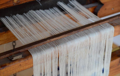 Behind the loom